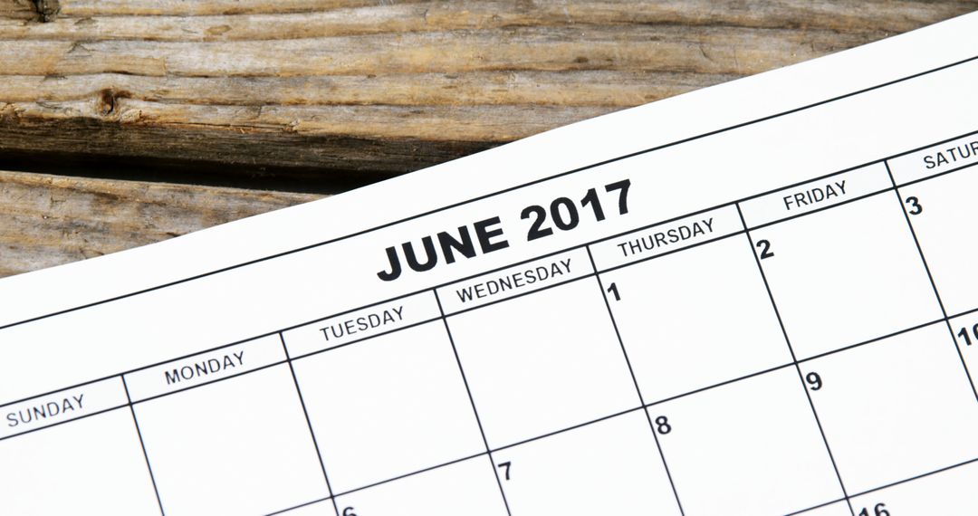 June 2017 Calendar Page on Rustic Wooden Surface - Free Images, Stock Photos and Pictures on Pikwizard.com
