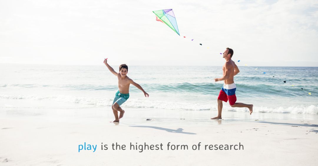Father and Son Enjoy Kite Flying on Scenic Beach