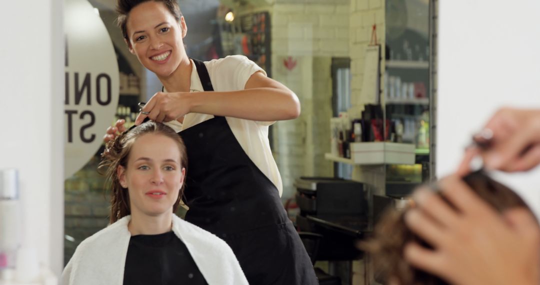 Hair Stylist Giving Woman Haircut in Modern Salon - Free Images, Stock Photos and Pictures on Pikwizard.com