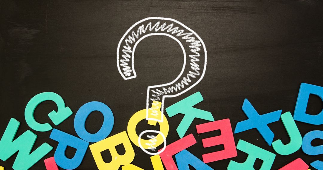 Question Mark with Colorful Letters on Blackboard