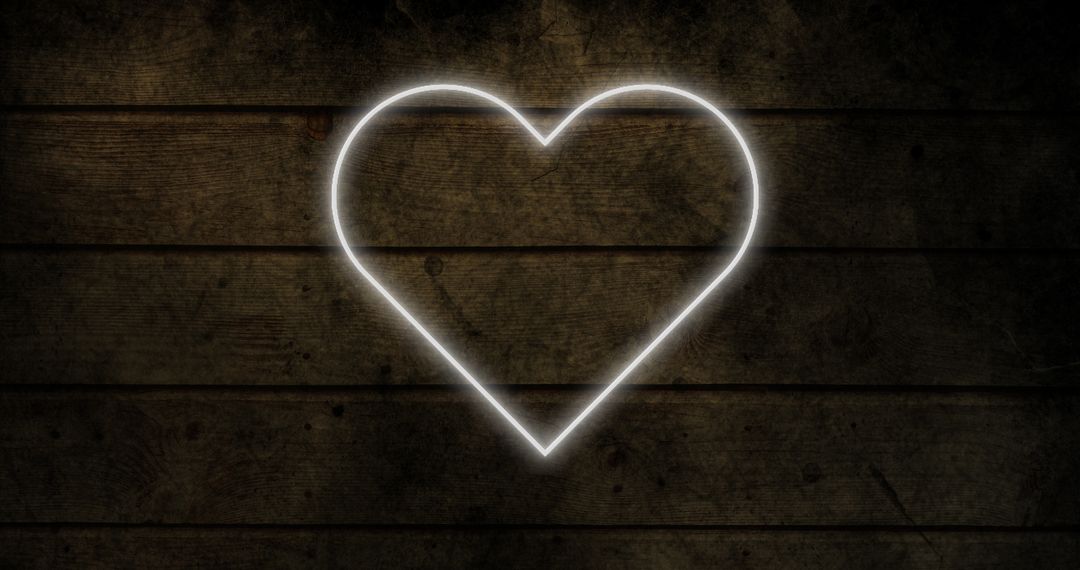 Glowing Neon Heart Icon on Rustic Wooden Wall