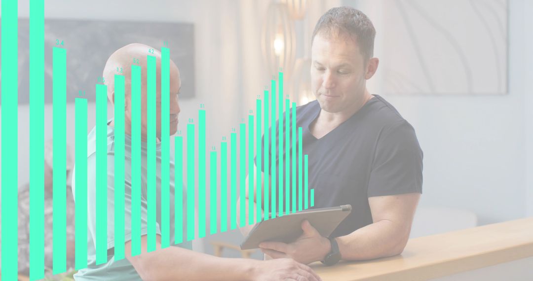 Two men reviewing tablet at reception desk with teal data overlay, colleagues consulting