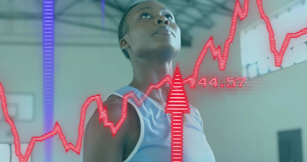 Woman Athlete Focusing on Goal with Digital Performance HUD Overlay in Indoor Court
