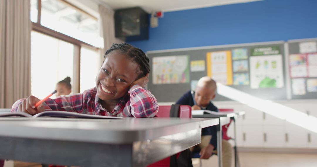 Smiling African American Students Engaged in Classroom Learning