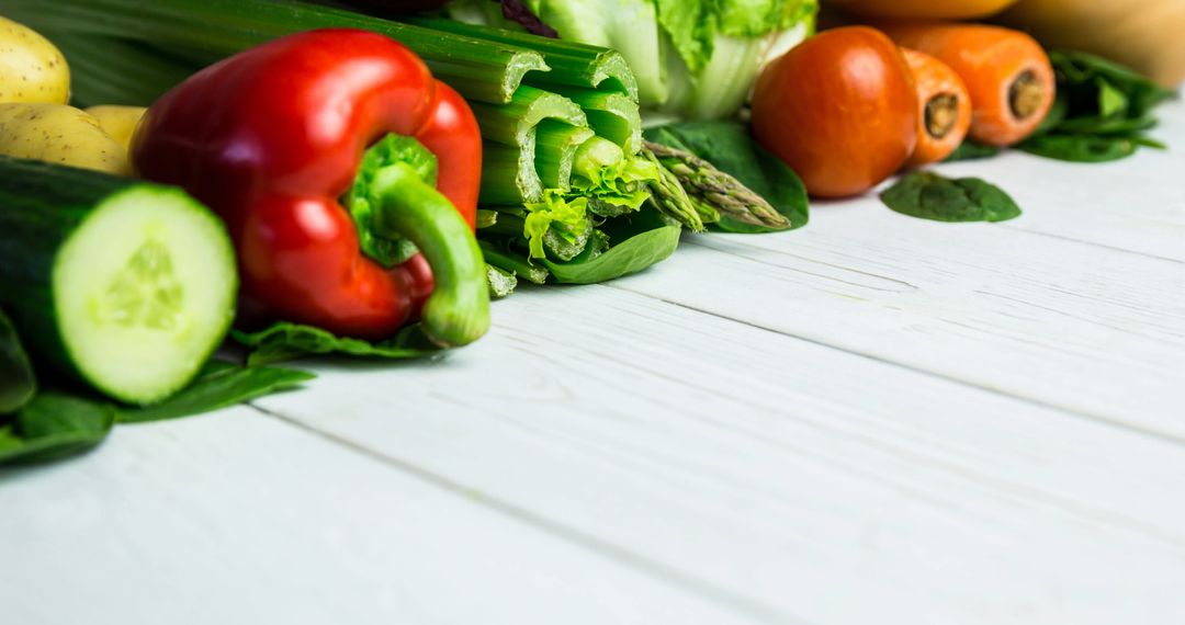 Close-Up of Fresh Vegetables on White Wooden Table