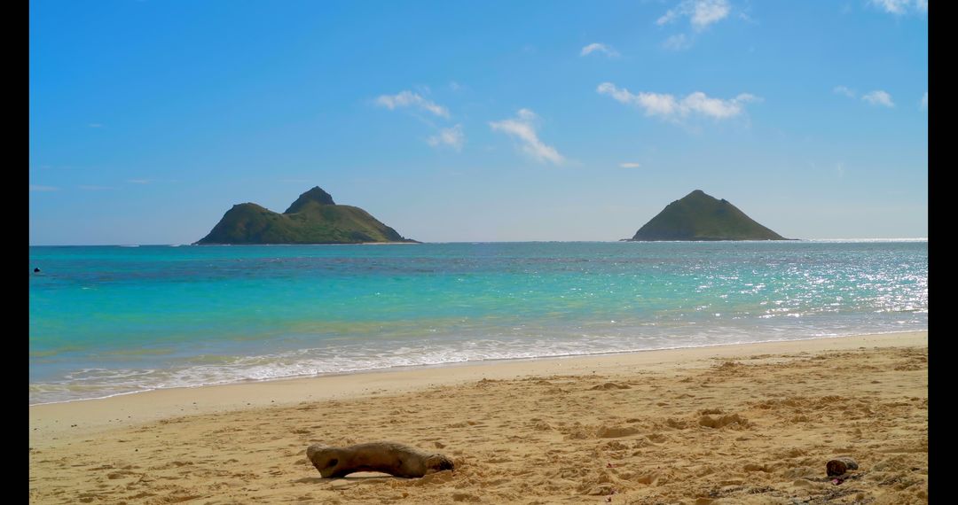 Tranquil Beach with Turquoise Water and Distant Islands - Free Images, Stock Photos and Pictures on Pikwizard.com