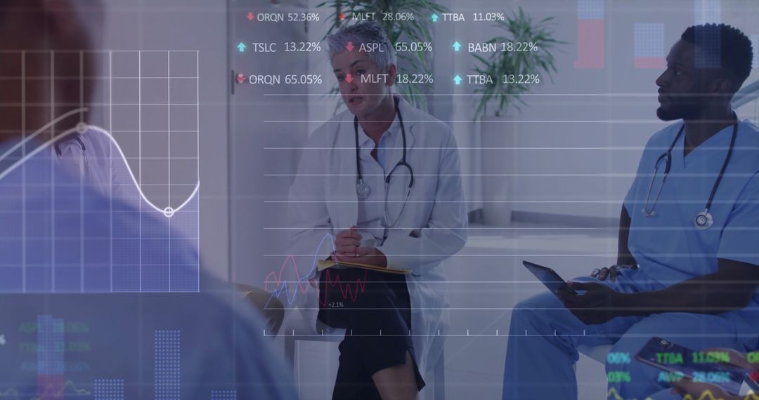 Medical Professionals Analyzing Digital Data in Modern Consultation