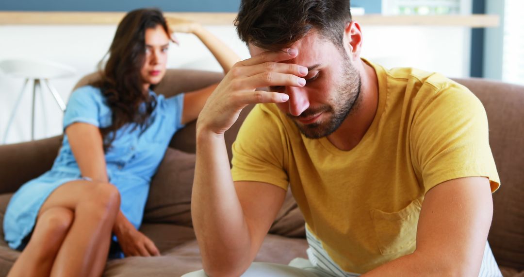 Stressed Couple Ignoring Each Other at Home
