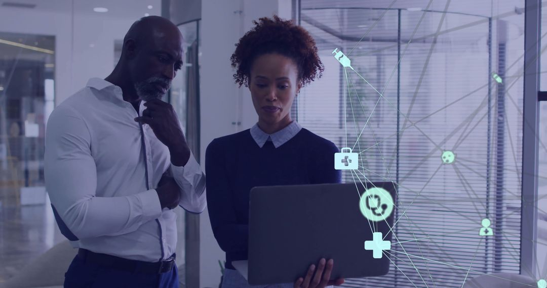 Diverse Colleagues Discussing Concepts in Modern Office