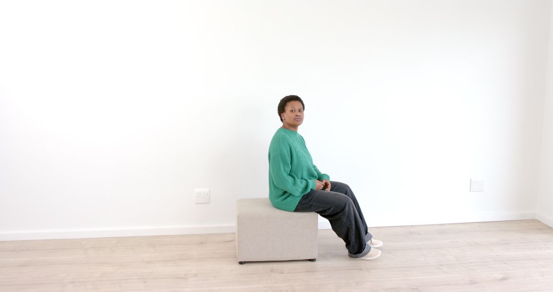 Serene Contemplation in Minimalist White Room