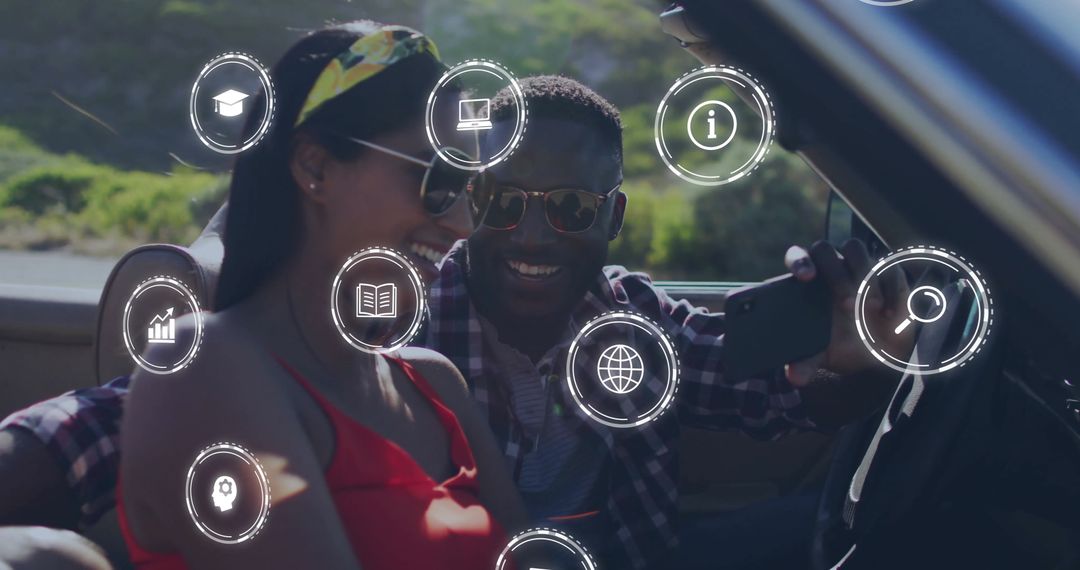 Couple Using Smartphone in Convertible with Digital Icons Overlay
