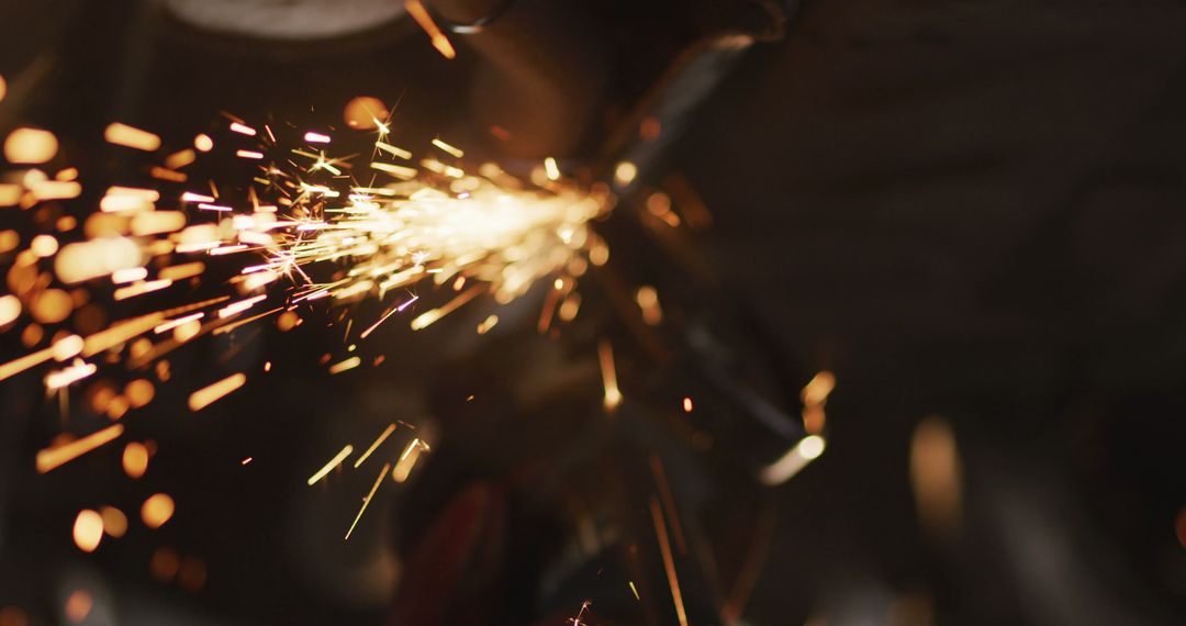 Close-up of sparking welding process in workshop - Free Images, Stock Photos and Pictures on Pikwizard.com