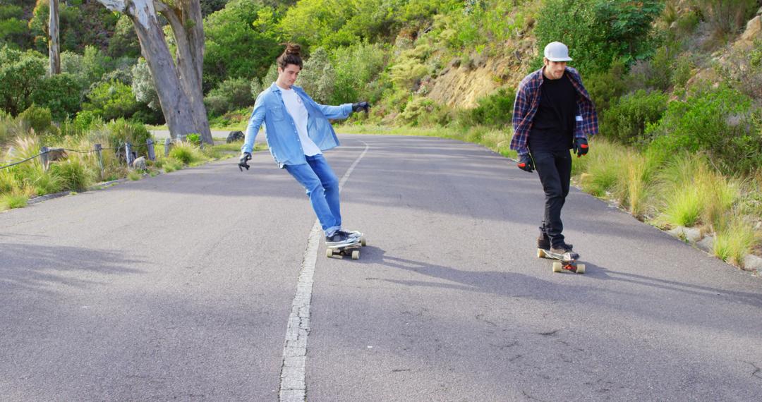 Teenagers Longboarding Down Road in Recreational Activity - Free Images, Stock Photos and Pictures on Pikwizard.com