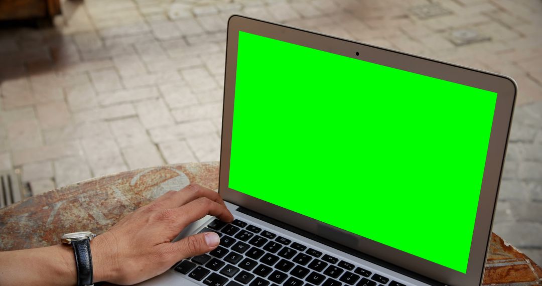 Hand Touching Laptop with Green Screen Outdoors - Free Images, Stock Photos and Pictures on Pikwizard.com