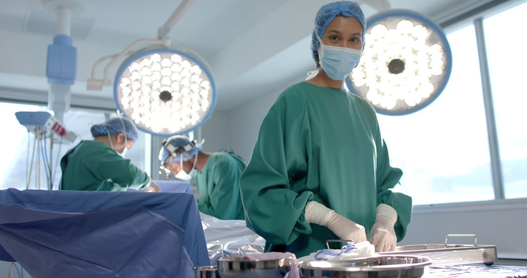 Focused Surgeon in Operating Room Preparing Surgical Instruments