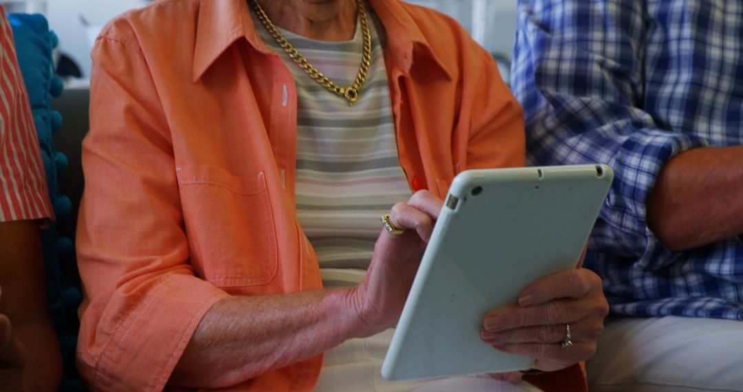 Senior Woman Using Digital Tablet - Free Images, Stock Photos and Pictures on Pikwizard.com