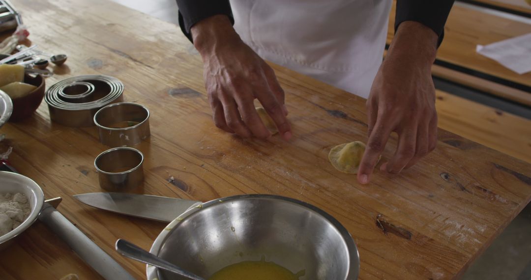 Close-up of Chef Preparing Homemade Dumplings on Wooden Table - Free Images, Stock Photos and Pictures on Pikwizard.com