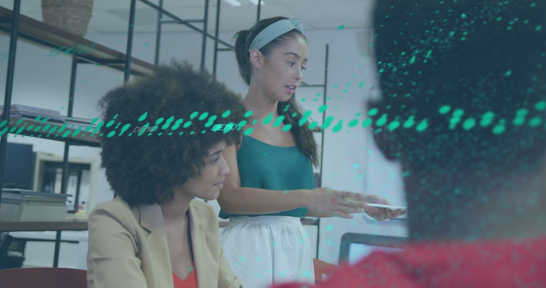 Diverse Team Collaborating with Data Visualization in Office