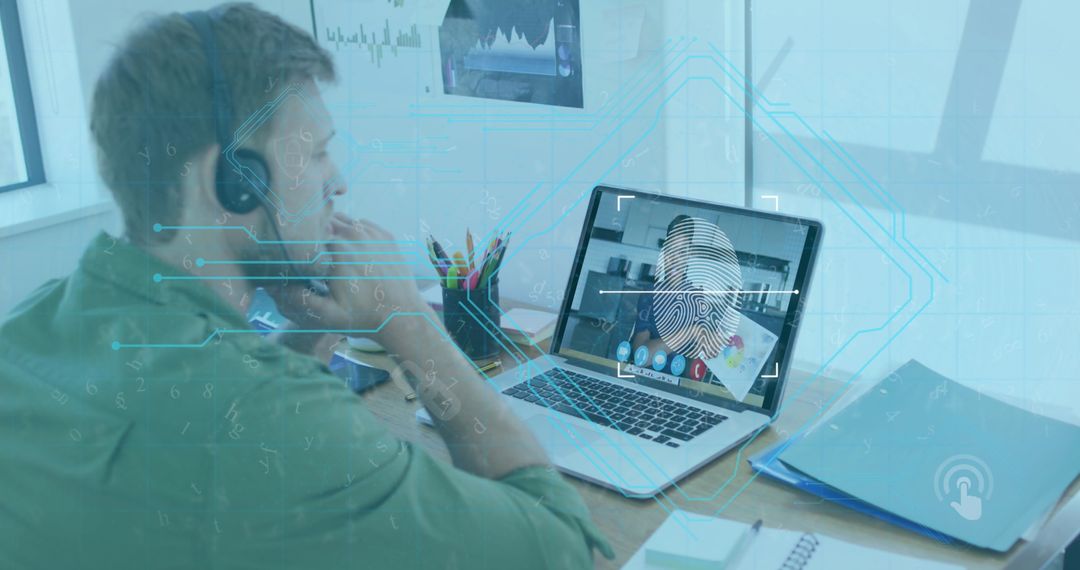 Man Engaging in Biometric Fingerprint Authentication on Laptop