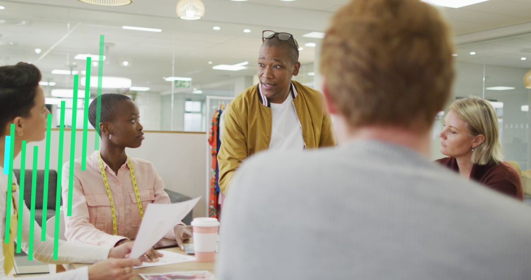 Diverse Team Collaborating in Modern Office with Digital Graph Overlays