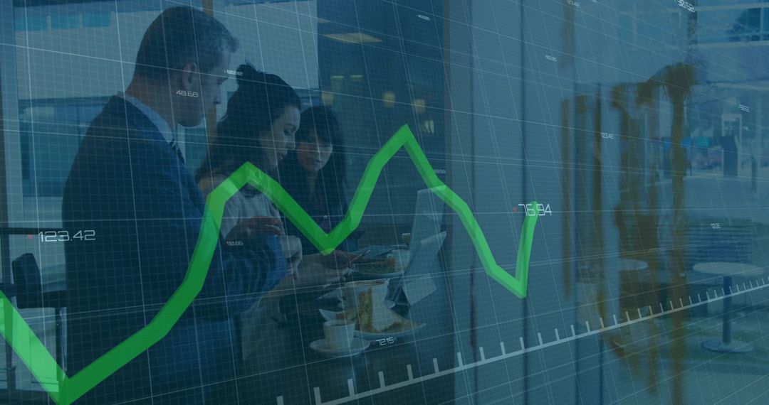 Business team collaborating, reviewing laptop analytics in coworking lobby with green growth