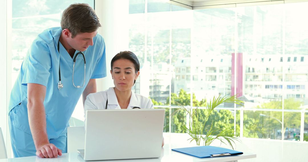 Medical Professionals Collaborating in Modern Office - Free Images, Stock Photos and Pictures on Pikwizard.com