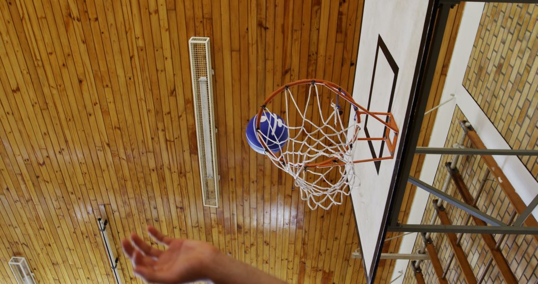 Basketball Scoring Point in Indoor Gymnasium with Copy Space