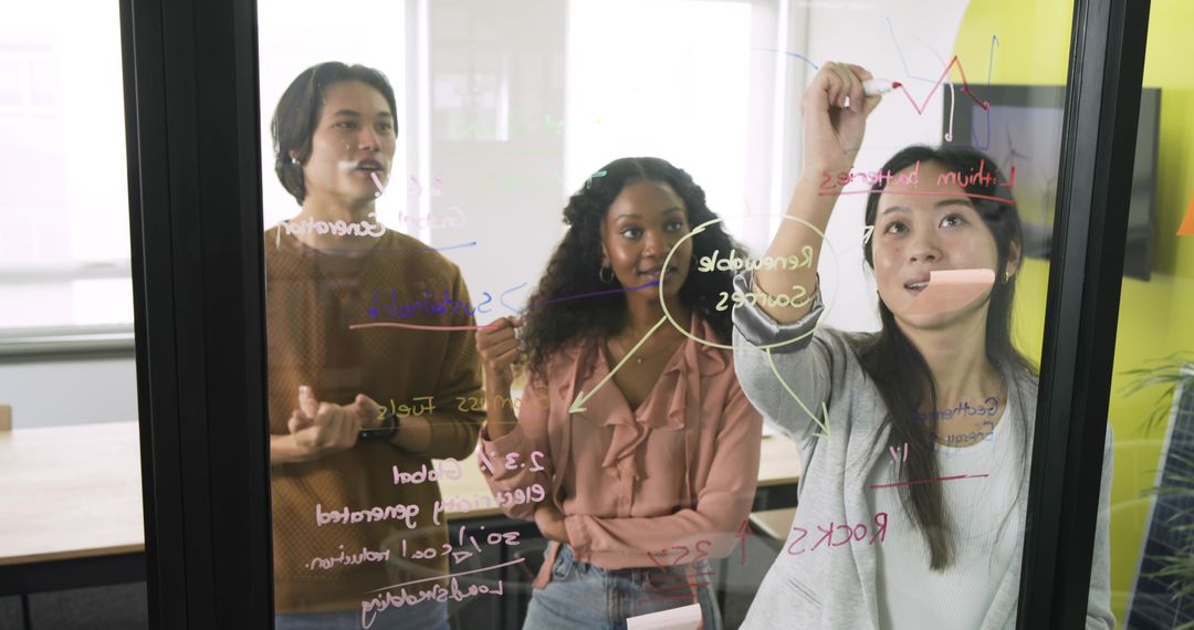 Diverse Coworkers Brainstorming at Glass Board