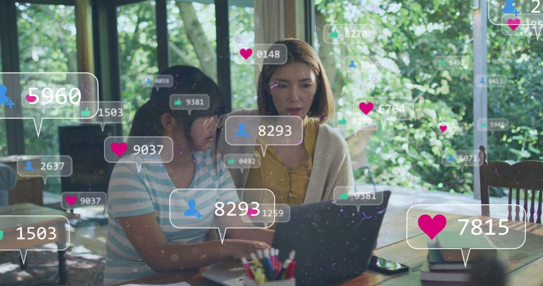 Teacher and Student Engaged in Social Media Analytics on Laptop