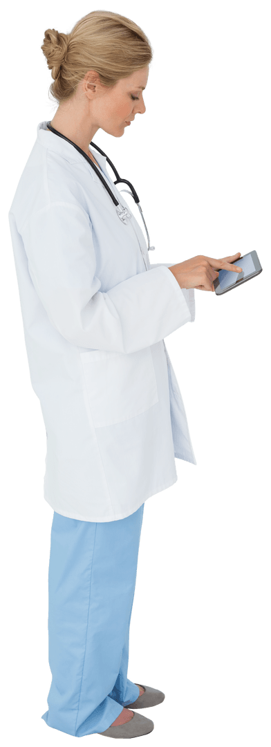 Medical Professional in White Coat Holding Transparent Tablet