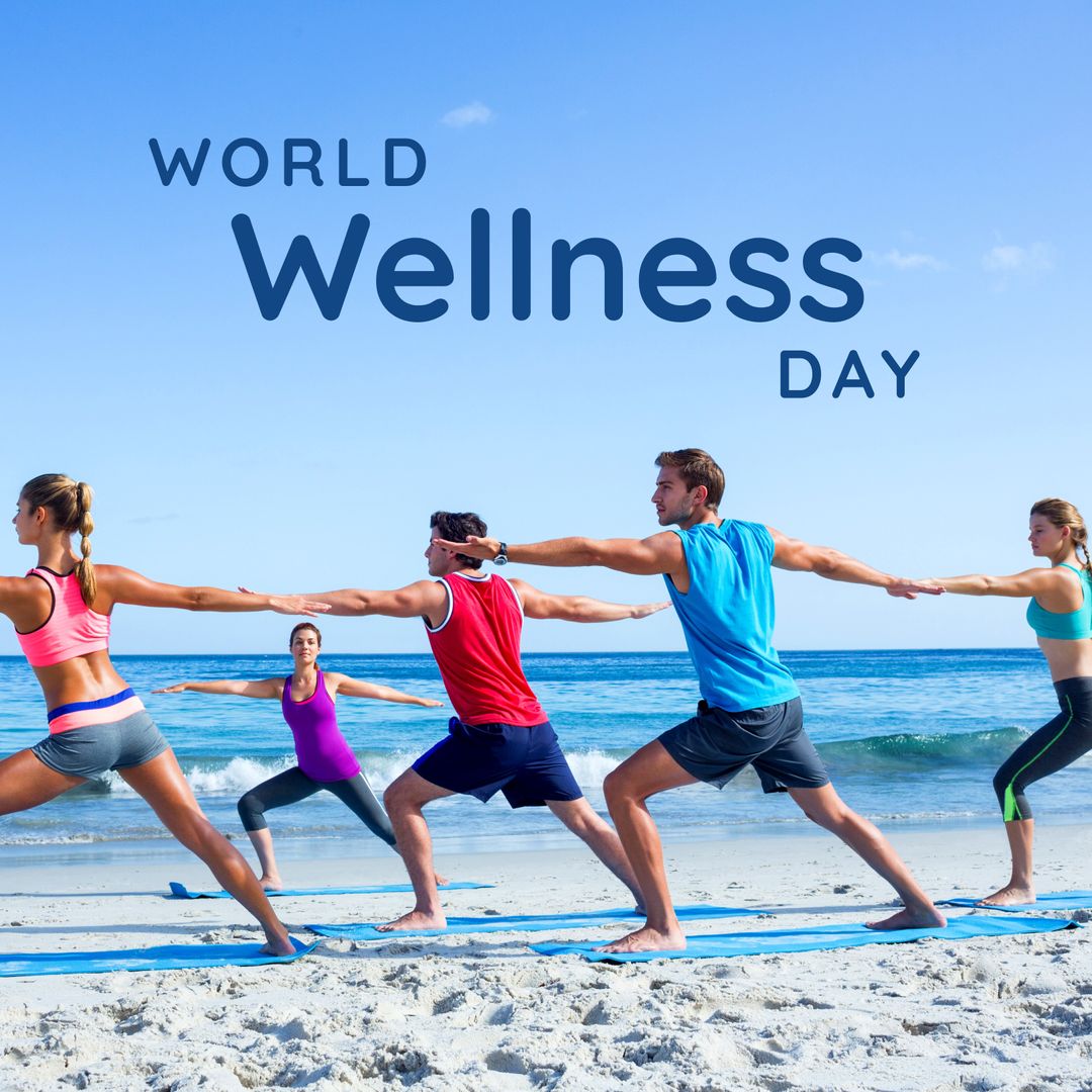 Group Yoga Practice on Beach for World Wellness Day