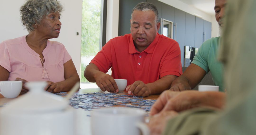 Senior African American Family Solving Puzzle Together at Home - Free Images, Stock Photos and Pictures on Pikwizard.com