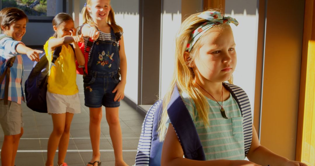 Sad Schoolgirl Experiencing Bullying from Peers