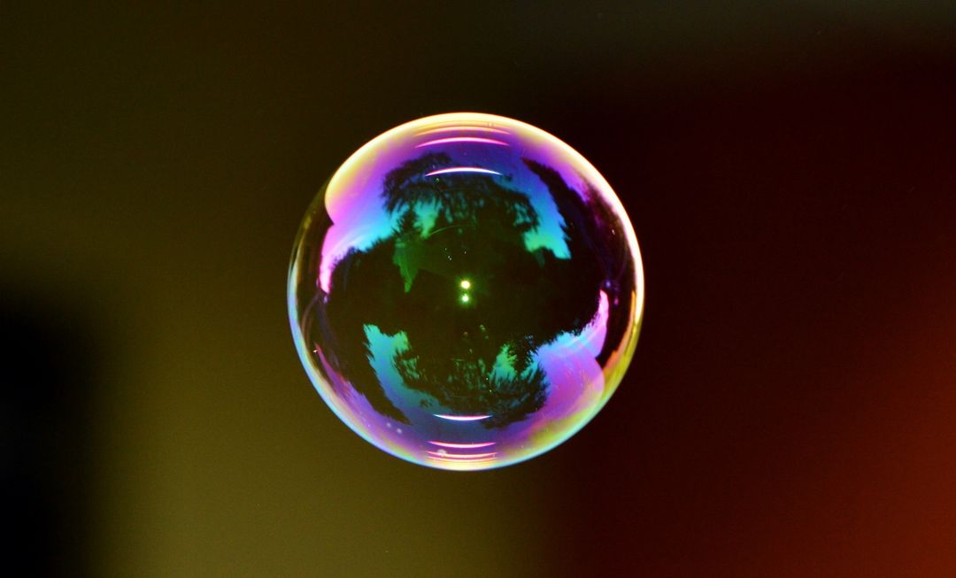 Close-Up of Colorful Soap Bubble on Dark Background - Free Images, Stock Photos and Pictures on Pikwizard.com