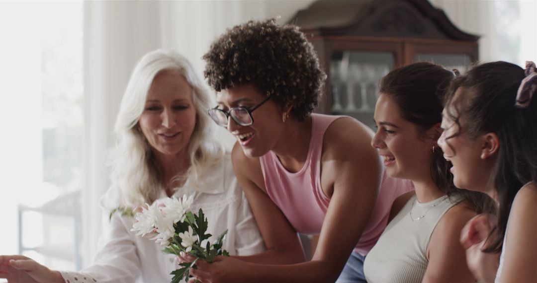 Women Collaborating in Flower Arranging Session