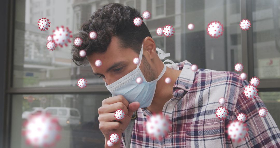 Masked Man Coughing Amid Symbolic Virus Particles
