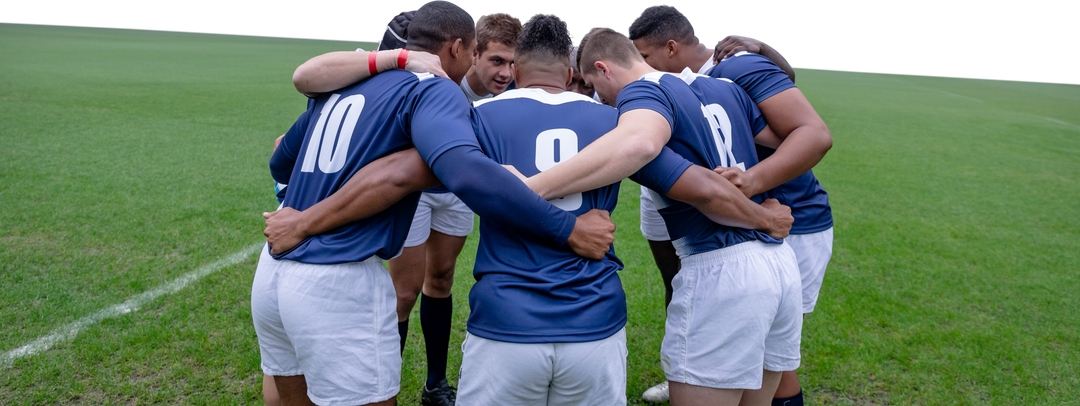 Diverse Rugby Players Huddling on Grass Field, Transparent Background - Download Free Stock Images Pikwizard.com