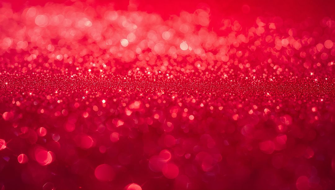 Shimmering red glitter bokeh background with sparkling sequin texture and macro detail