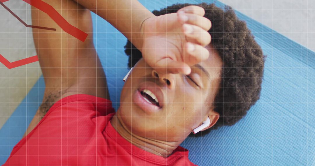 Exhausted Athlete Resting with Digital Fitness Insights