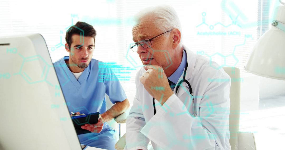 Experienced Doctors Examining Medical Data on Screen