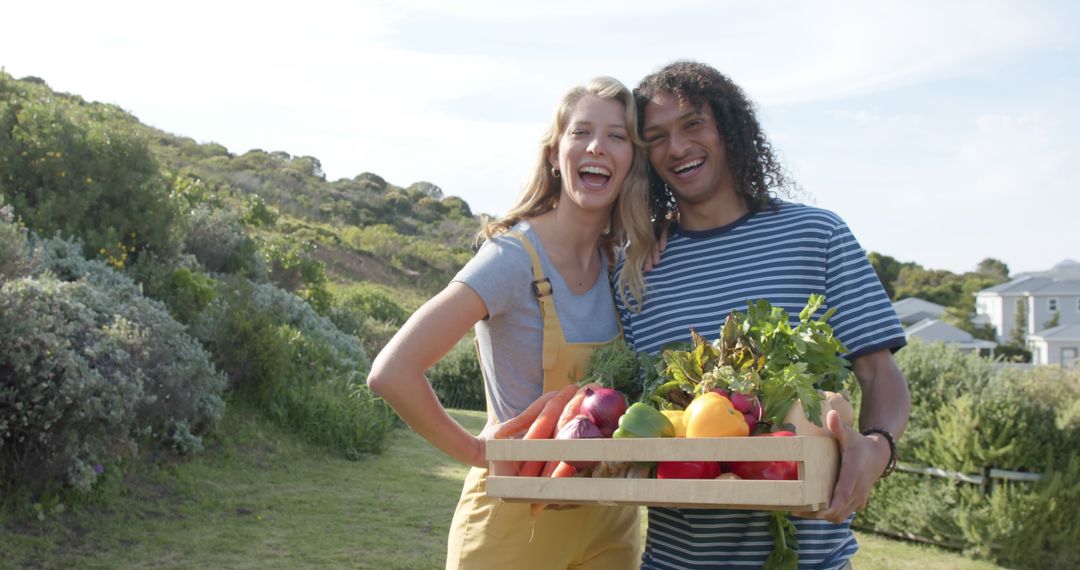 Happy Couple with Fresh Produce in Sunny Garden - Free Images, Stock Photos and Pictures on Pikwizard.com