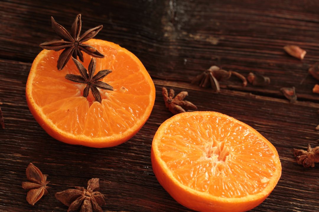 Fresh Citrus Slices with Star Anise on Rustic Wooden Background - Free Images, Stock Photos and Pictures on Pikwizard.com