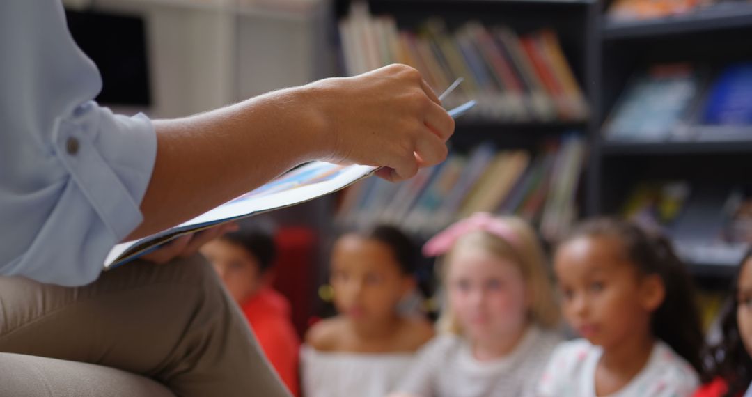 Teacher Engaging Young Students in Library Storytime Session