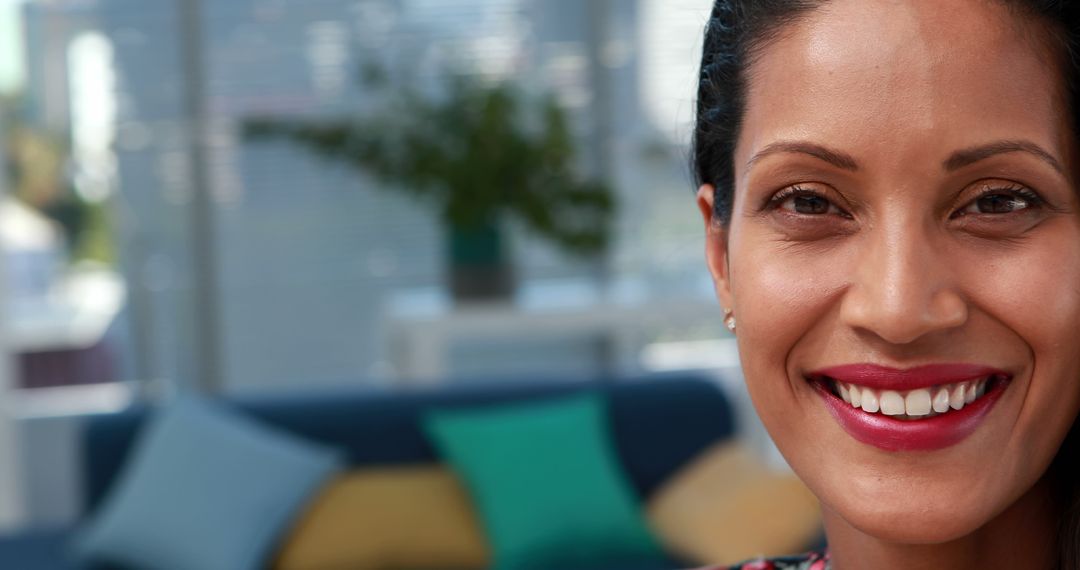 Confident Professional Businesswoman Smiling Indoors with Copy Space