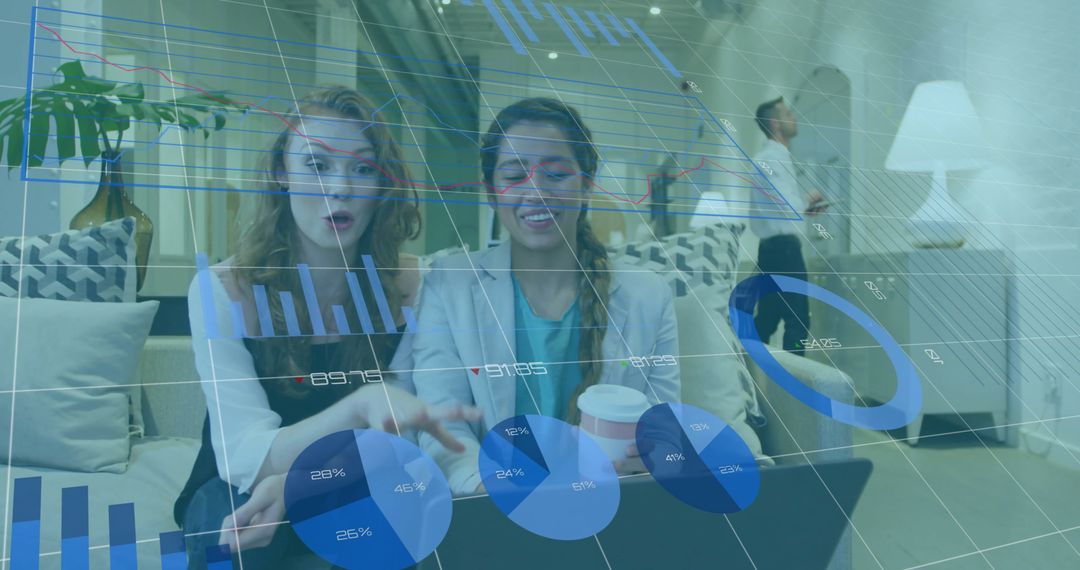 Colleagues Analyzing Financial Data Digitally in Modern Office