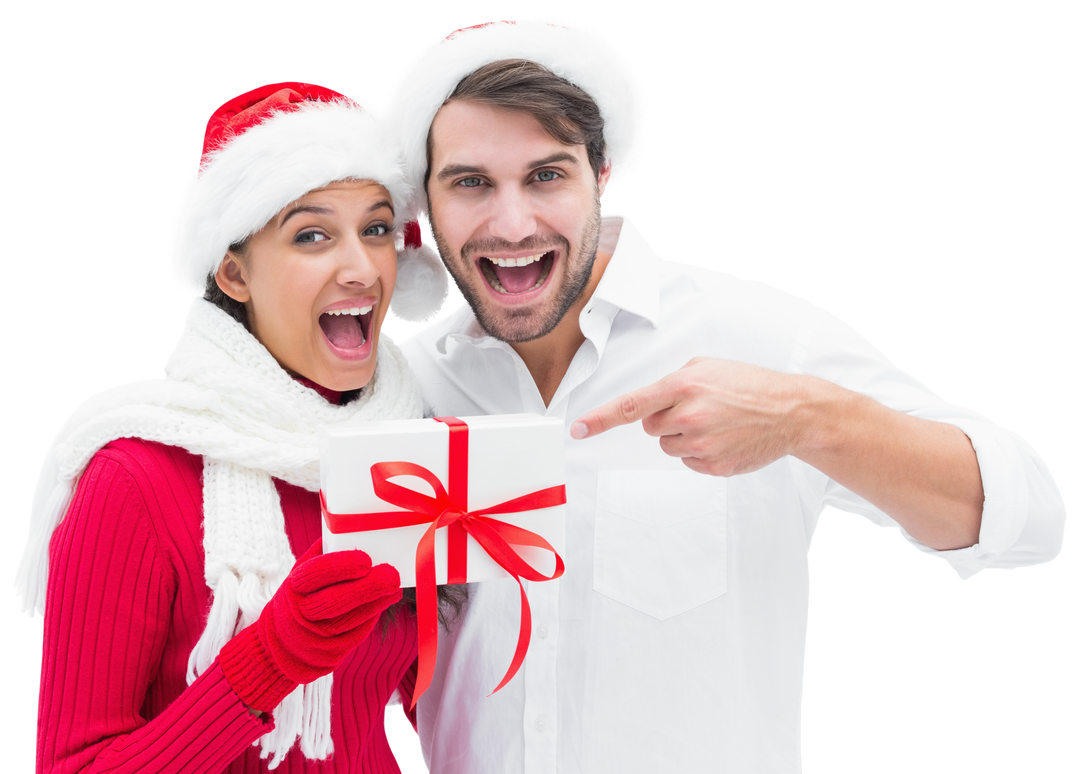 Joyful Couple Holding Gift, Wearing Santa Hats on Transparent Background - Download Free Stock Images Pikwizard.com