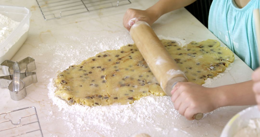 Child Rolling Cookie Dough with Rolling Pin - Free Images, Stock Photos and Pictures on Pikwizard.com