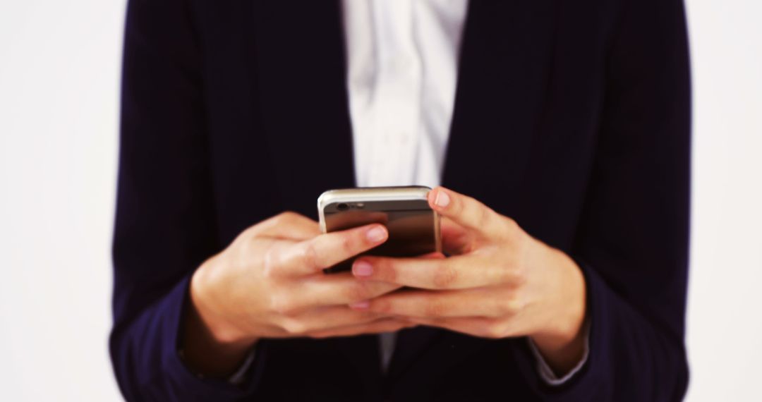 Businessperson Texting on Smartphone in Office - Free Images, Stock Photos and Pictures on Pikwizard.com