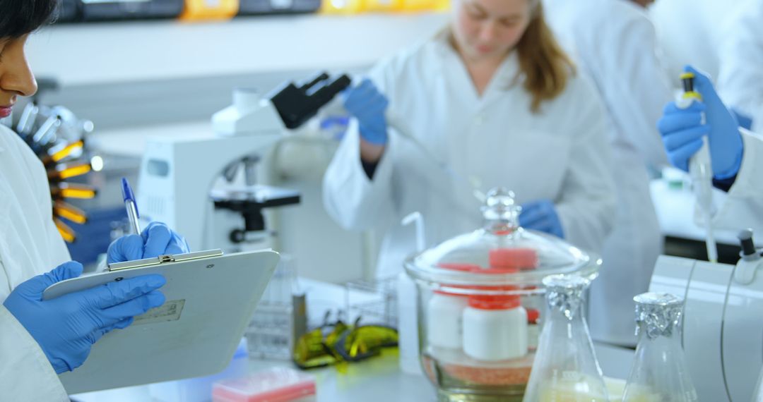 Scientists Conducting Research in Laboratory with Advanced Equipment - Free Images, Stock Photos and Pictures on Pikwizard.com