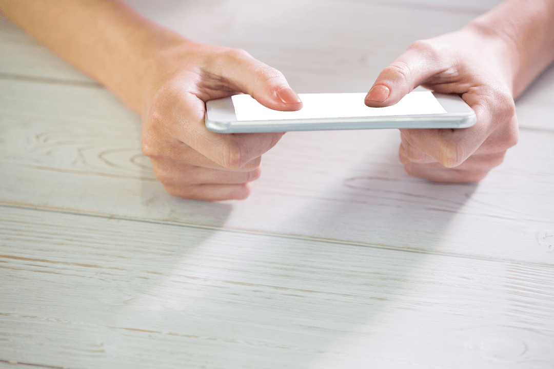 Caucasian Hands Holding Smartphone on Transparent Background with Copy Space